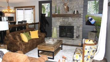 Smart TV, fireplace, books