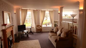 Apartment, 1 Bedroom | Living room | TV