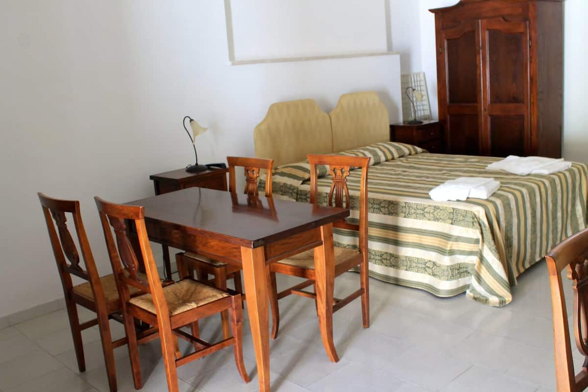 Quadruple Room, Patio, Garden View | Desk, free WiFi