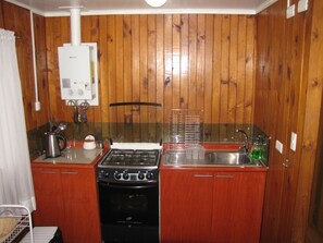 Standard Cabin, 3 Bedrooms | Private kitchen | Fridge, stovetop, cookware/dishes/utensils