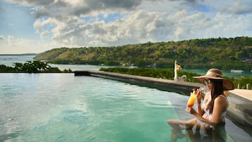 Outdoor pool, open 7:00 AM to 6:00 PM, pool umbrellas, sun loungers