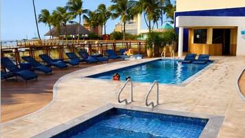 Outdoor pool, open 7:00 AM to 10:00 PM, pool loungers
