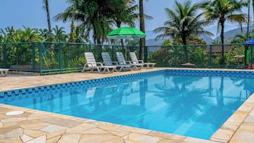 Outdoor pool, open 10:00 AM to 9:00 PM, pool umbrellas, pool loungers