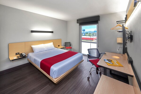 Desk, blackout drapes, iron/ironing board, free cribs/infant beds