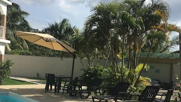Outdoor pool, pool umbrellas, pool loungers