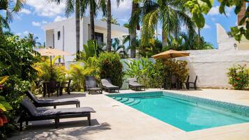 Outdoor pool, pool umbrellas, sun loungers