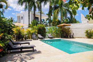 Outdoor pool, pool umbrellas, pool loungers