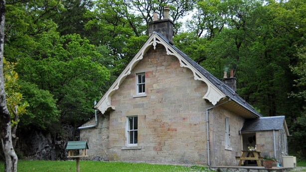 A stone cottage with a small porch and a chimney. - Craigendarroch 2 (Oban)