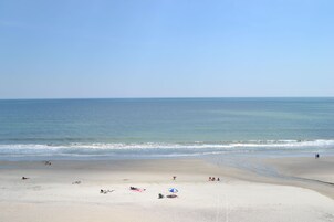 On the beach, white sand, beach umbrellas