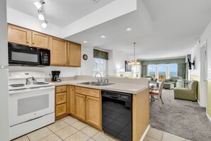 Traditional Condo, 3 Bedrooms | Private kitchen | Full-sized fridge, microwave, oven, stovetop - A Place at the Beach (North Myrtle Beach)
