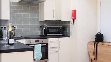 Highchair, cookware/dishes/utensils