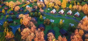 An aerial view of a residential area with multiple houses, roads, and trees. - Birch 22 With Hot Tub, Newton Stewart (Newton Stewart)