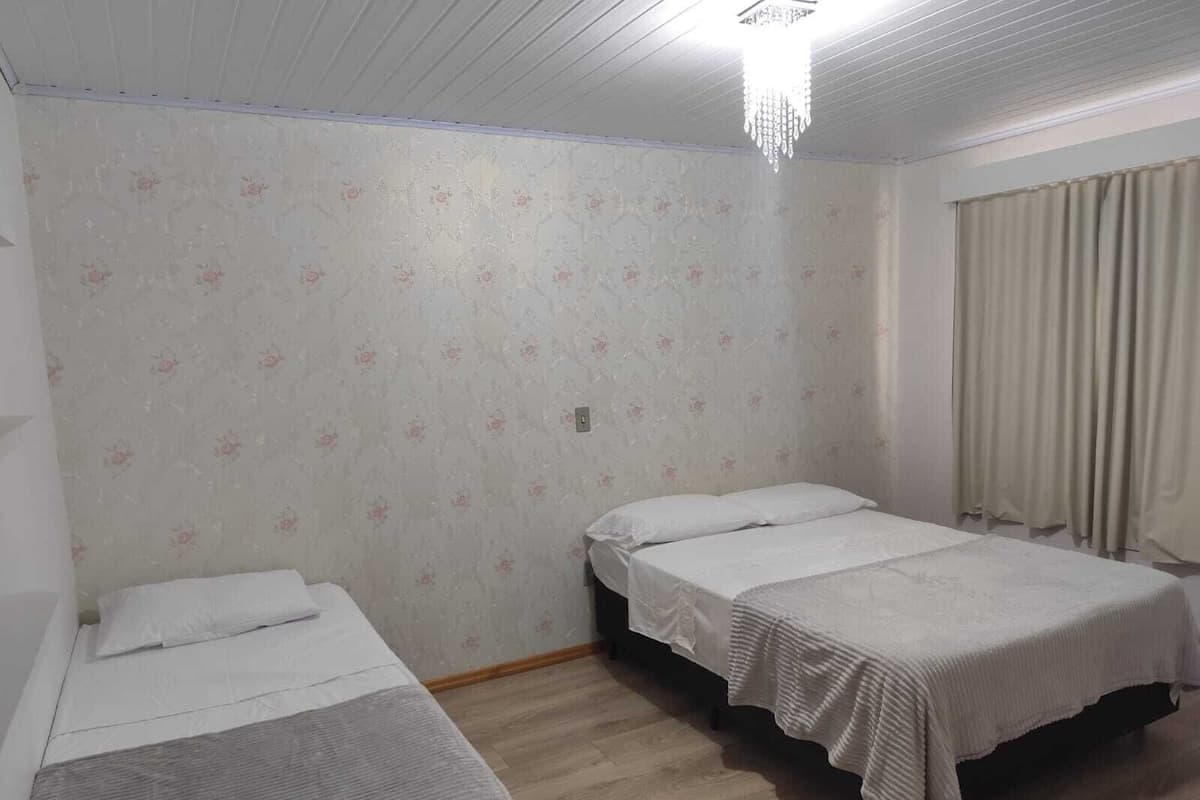 Standard Quadruple Room, Ground Floor | Minibar, laptop workspace, blackout drapes, free WiFi