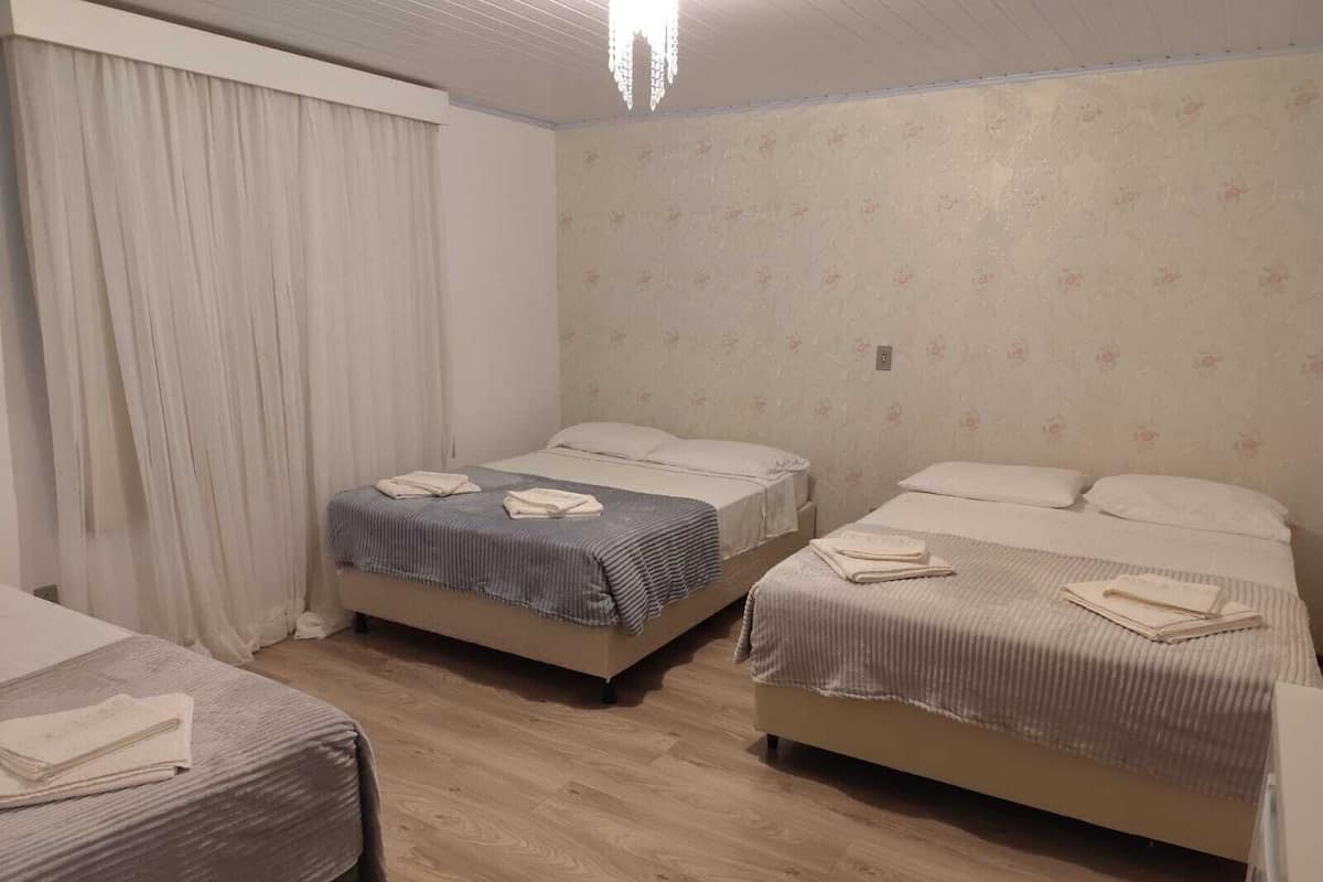 Family Room | Minibar, laptop workspace, blackout drapes, free WiFi