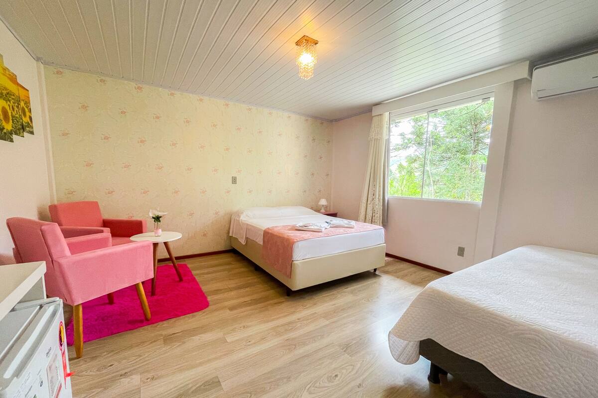 Premium Quadruple Room | Minibar, laptop workspace, blackout drapes, free WiFi
