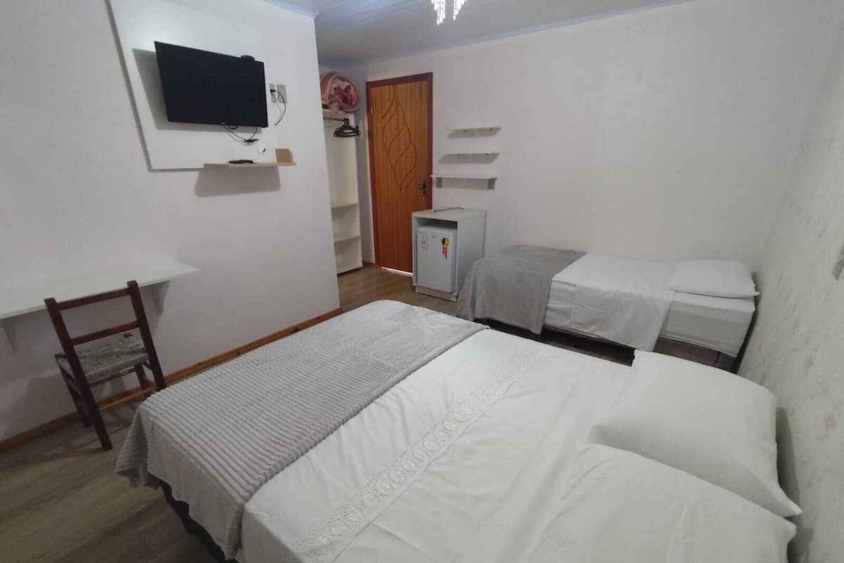 Standard Triple Room | Minibar, laptop workspace, blackout drapes, free WiFi