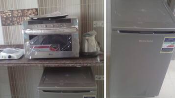 Luxury Apartment, 2 Bedrooms, Beach View | 2 bedrooms, free minibar, individually furnished, iron/ironing board