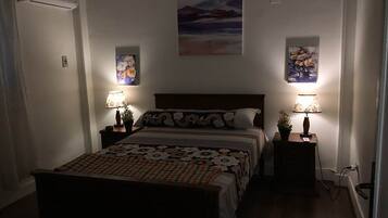 2 bedrooms, blackout drapes, soundproofing, iron/ironing board