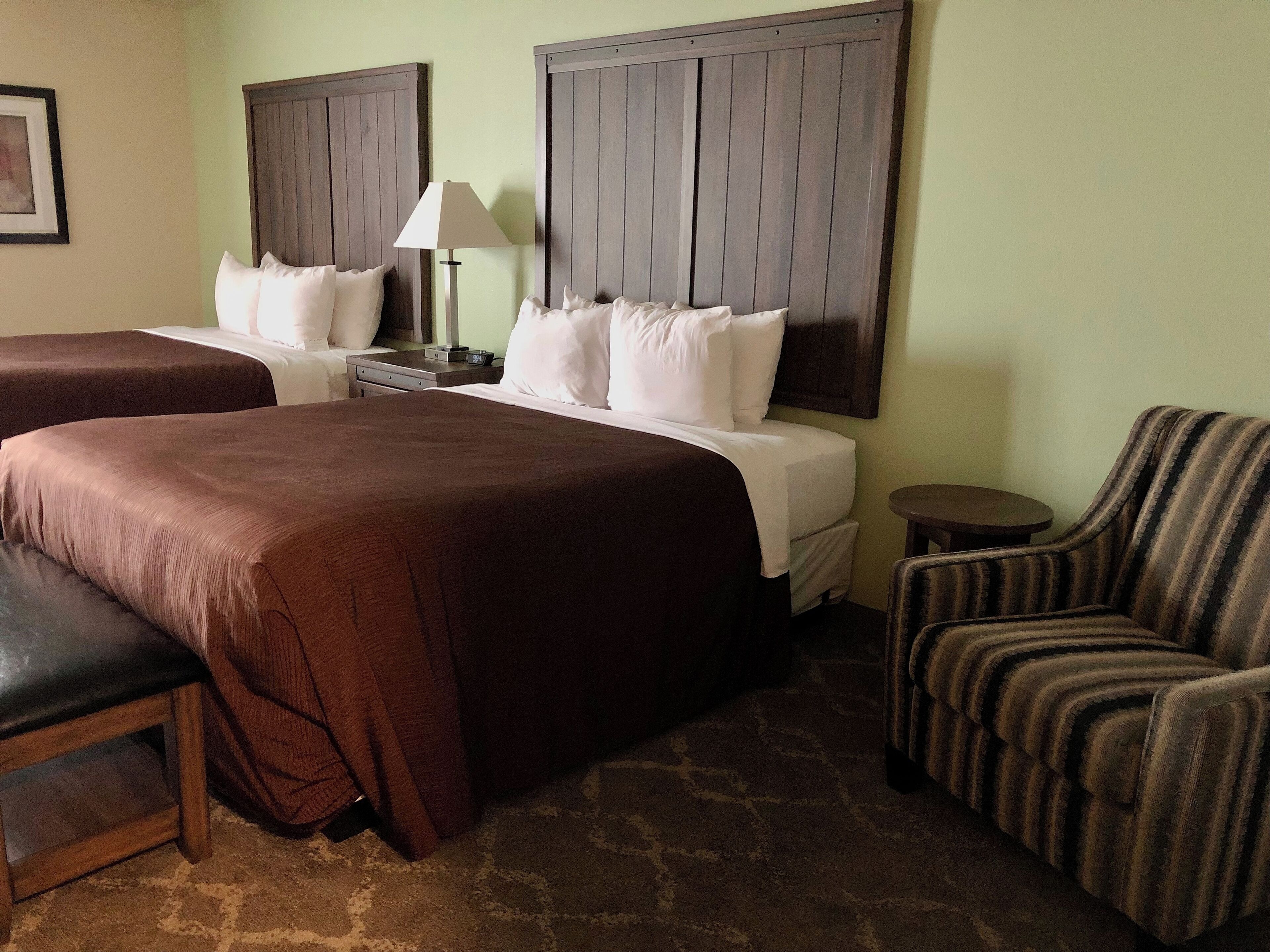 deluxe studio suite, 2 queen beds, kitchenette | premium bedding, desk, iron/ironing board, travel cot