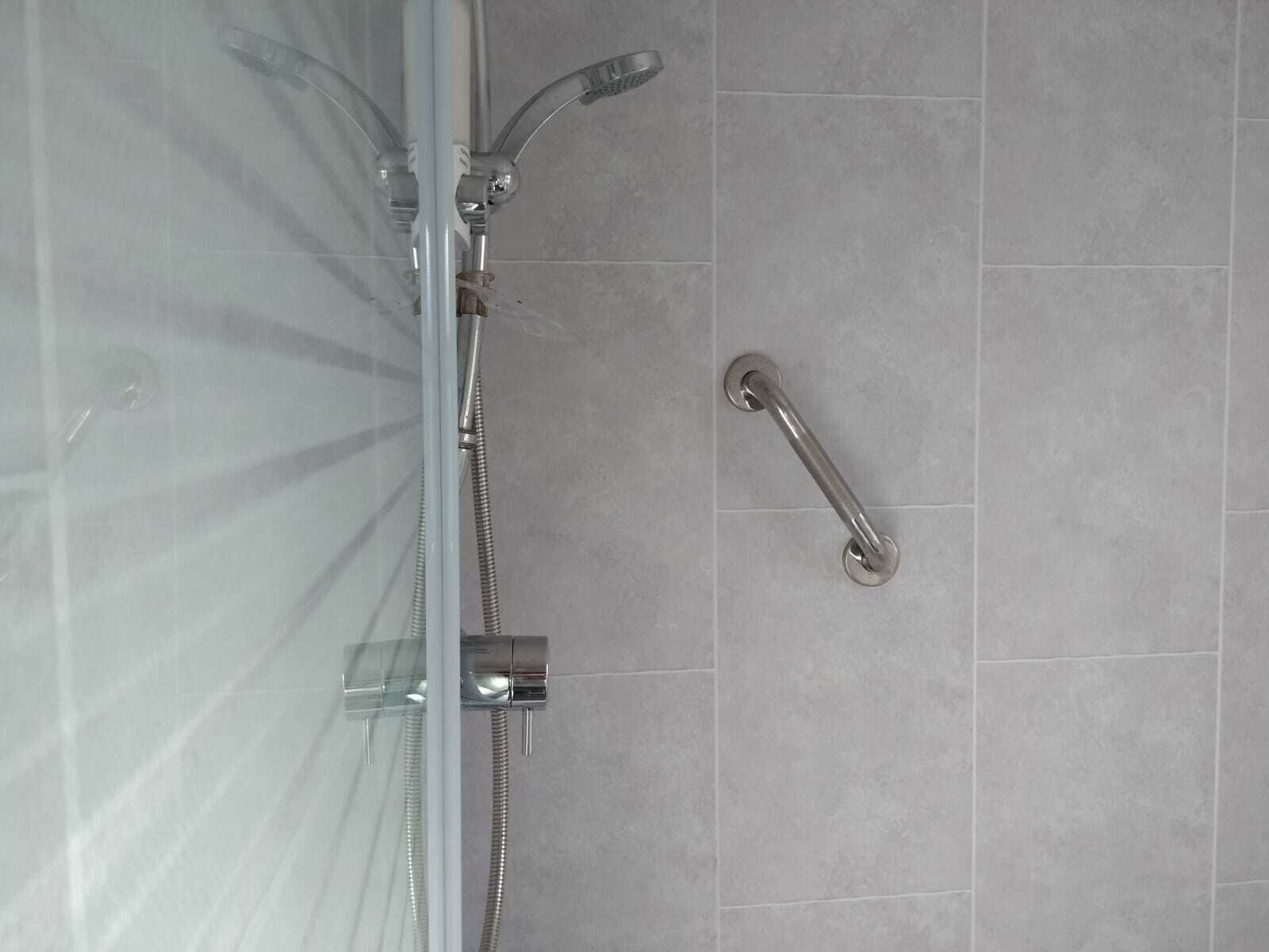 Combined shower/tub, hair dryer, towels, soap