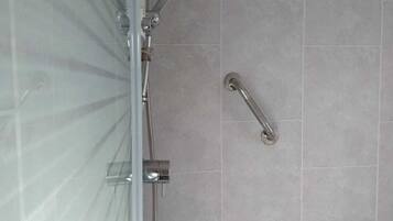 Combined shower/tub, hair dryer, towels, soap