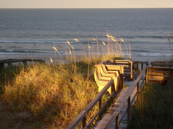 On the beach, sun-loungers