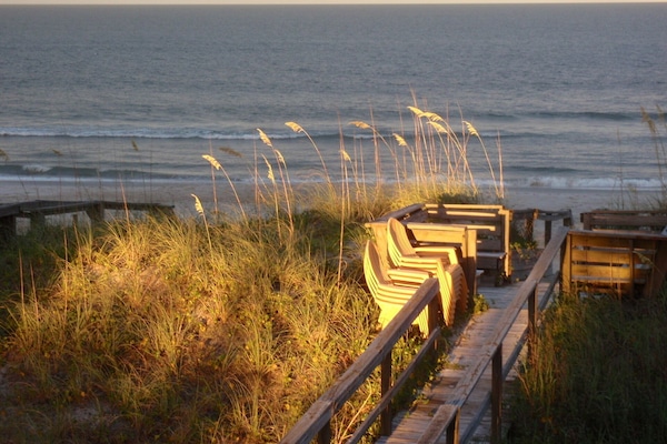 On the beach, sun loungers
