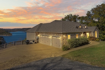 Vacation lavishly at Lakefront Luxury in a beautiful park-like setting!