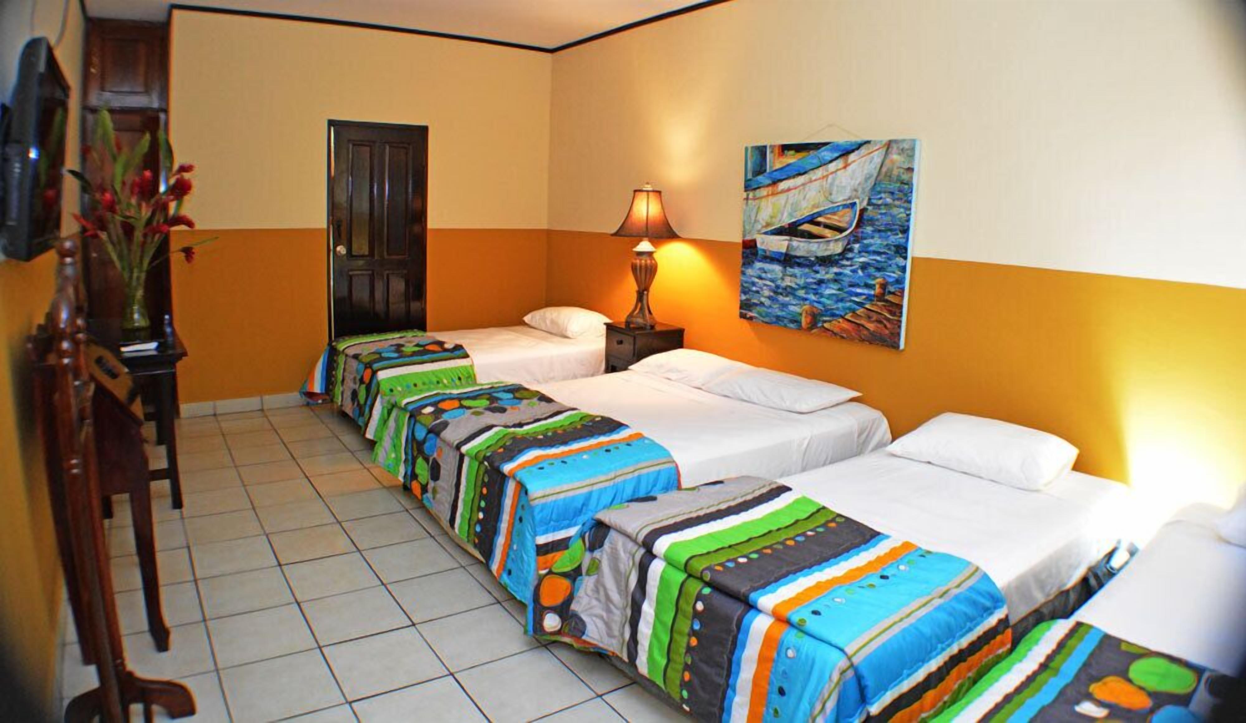 comfort quadruple room, multiple beds, non smoking | in-room safe, desk, free wifi, bed sheets