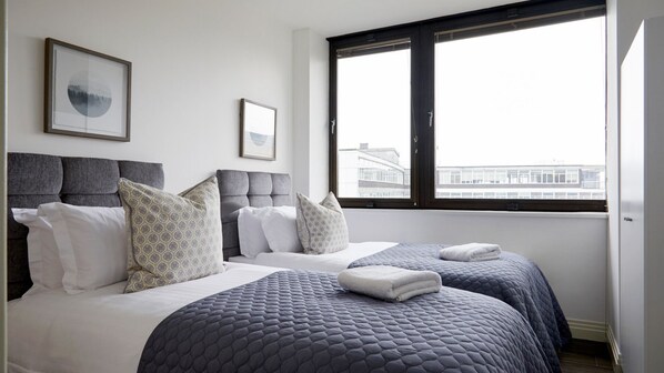 2 slaapkamers, een strijkplank/strijkijzer, gratis wifi