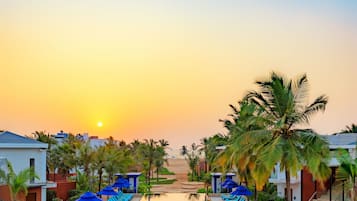 Outdoor pool, open 7 AM to 7 PM, pool loungers