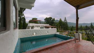 Outdoor pool, sun loungers