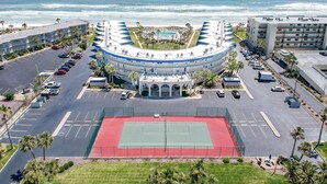 A hotel with a circular layout, a tennis court, and a pool. - Sandpiper 109 - Ground floor with all the upgrades! (St. Augustine)