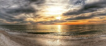 PRIME LOCATION ON AMI**CONDO DIRECTLY ON WHITE SUGAR SAND BEACH**HEATED POOL 