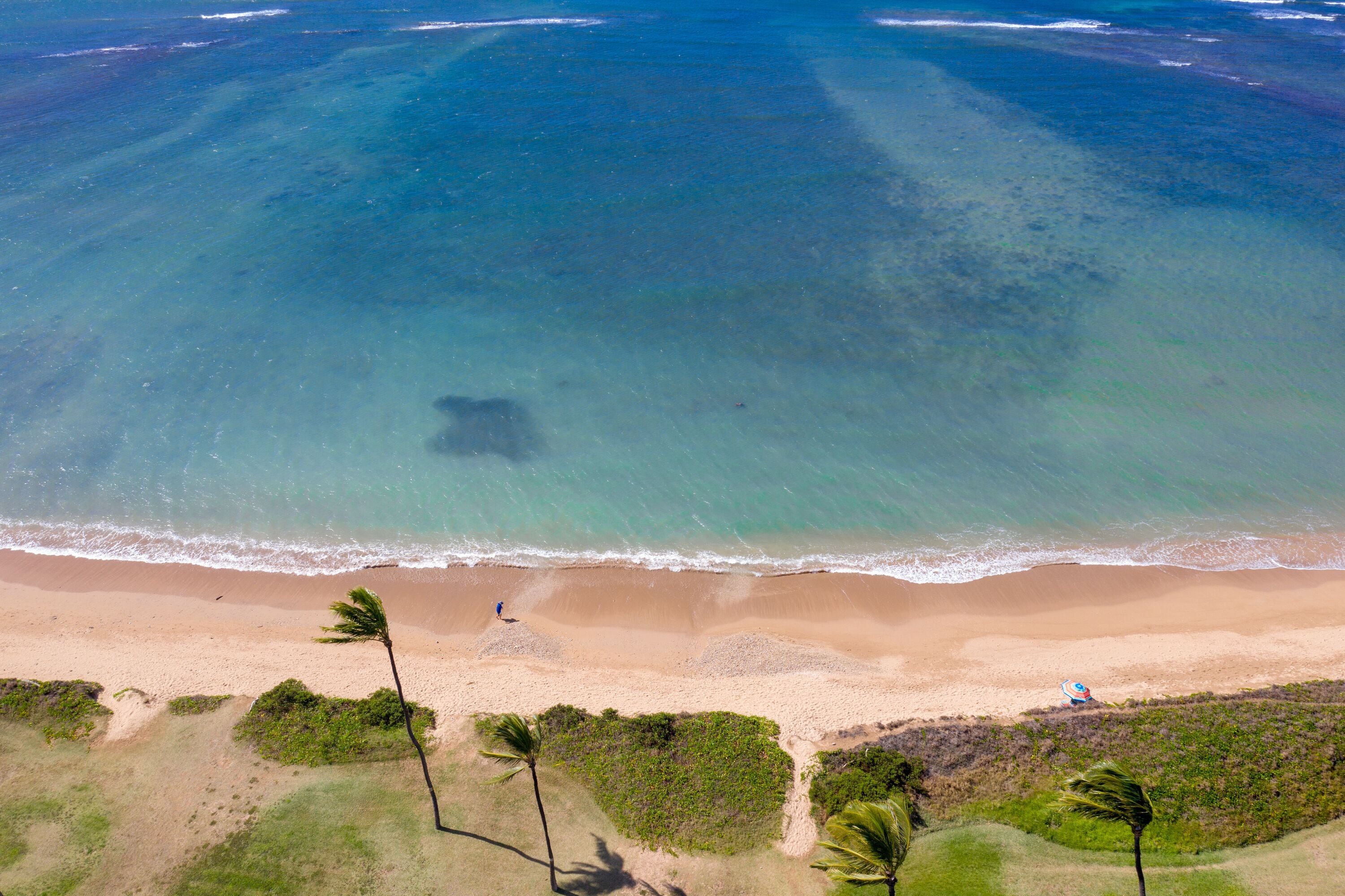 On the beach, sun loungers, beach towels