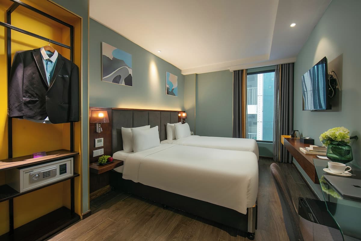 Deluxe Room | Peralatan tempat tidur premium, tilam berlapik, peti besi dalam bilik