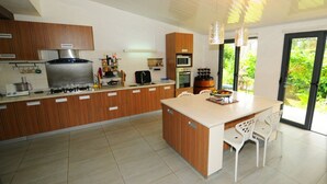 Apartment, 3 Bedrooms | Private kitchen | Espresso maker, full-size fridge, microwave, oven - Villa Antema (Surinam)