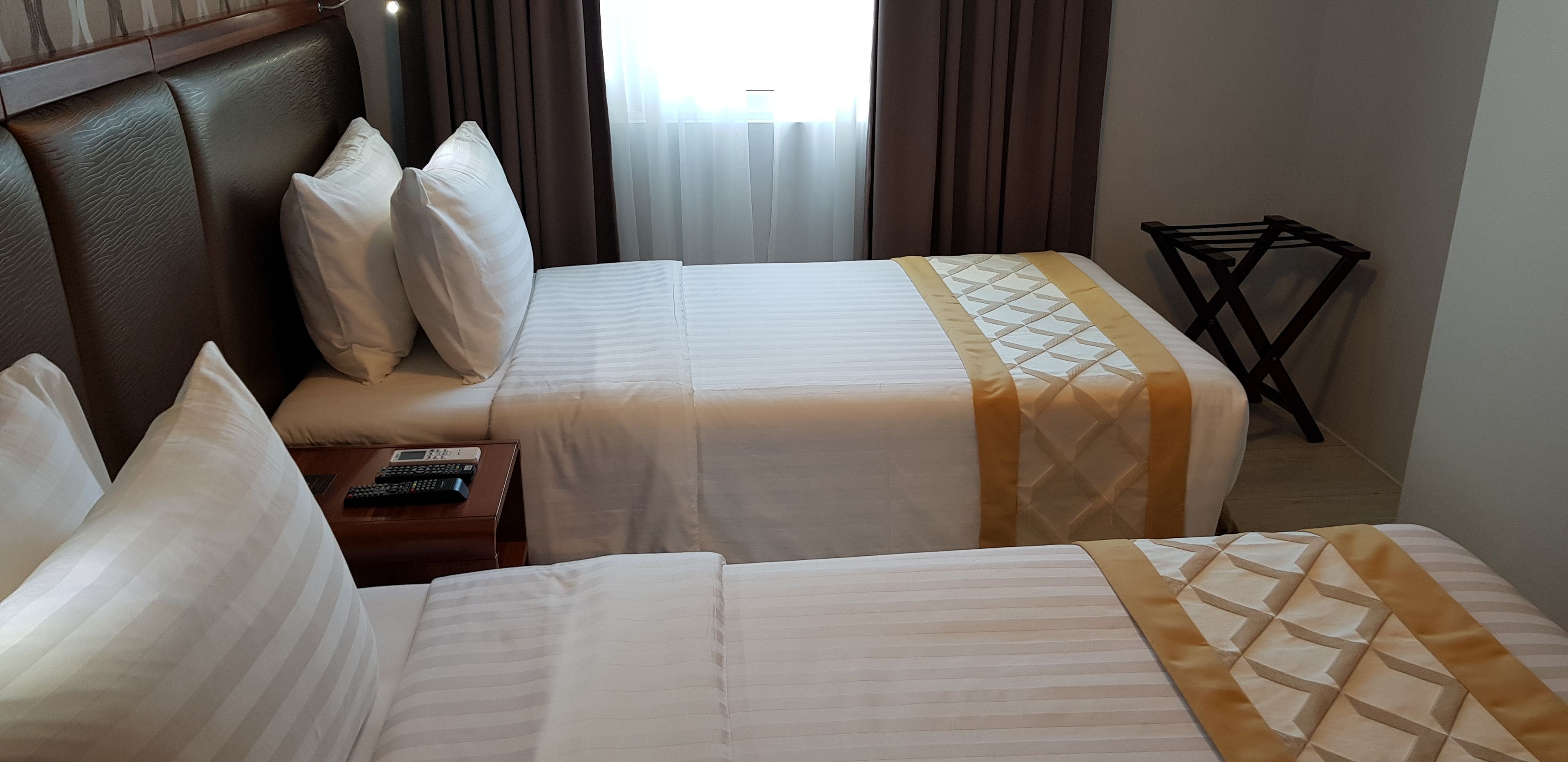 deluxe twin room | in-room safe, desk, blackout curtains, free wifi