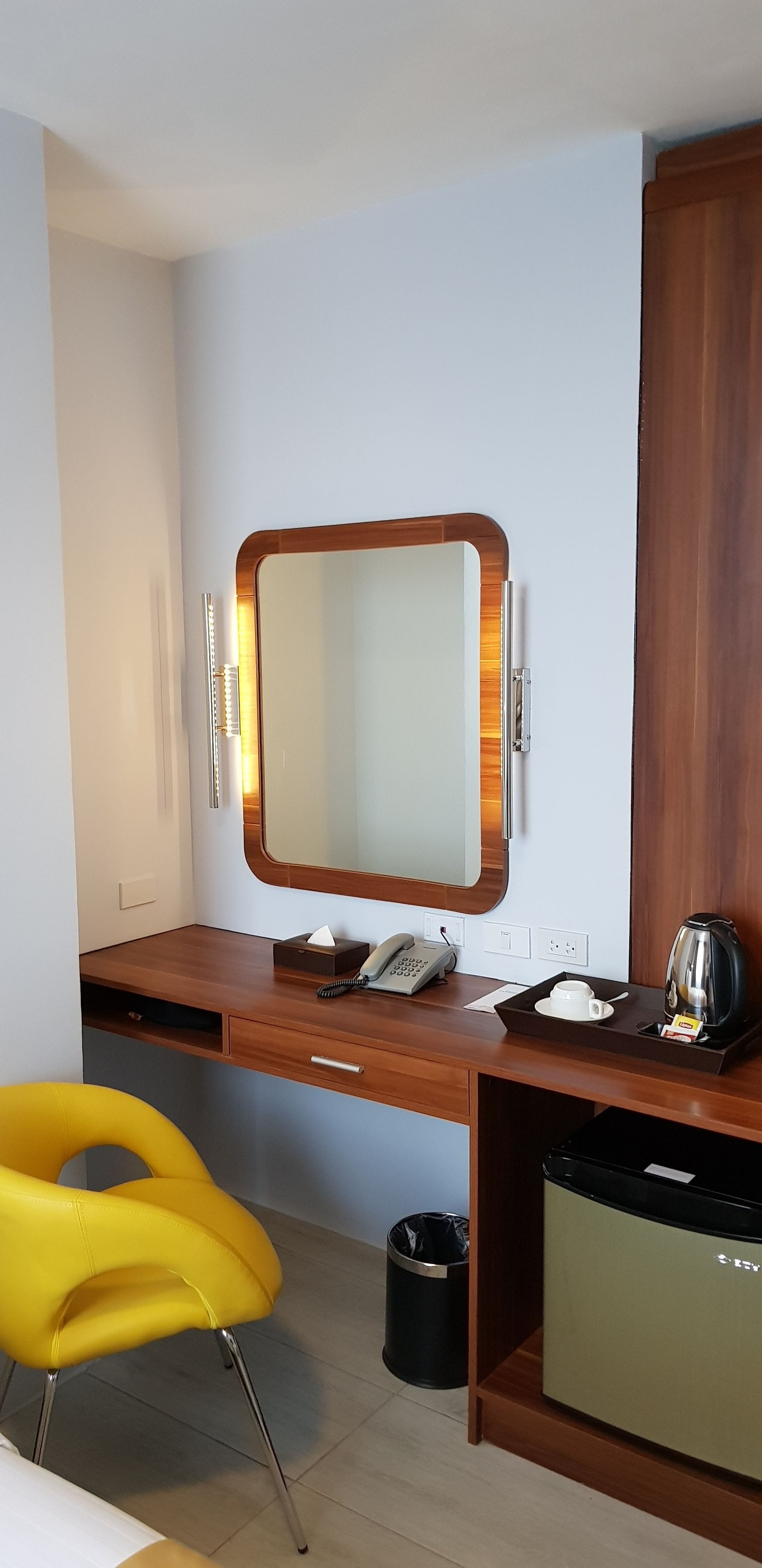 deluxe single room | in-room safe, desk, blackout curtains, free wifi