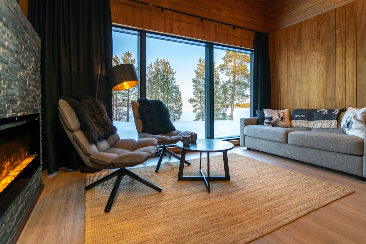 Inari Arctic Chalet | Living area | Heated floors