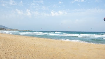 Sun-loungers, beach umbrellas, beach towels