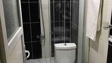 Shower, free toiletries, hair dryer, slippers