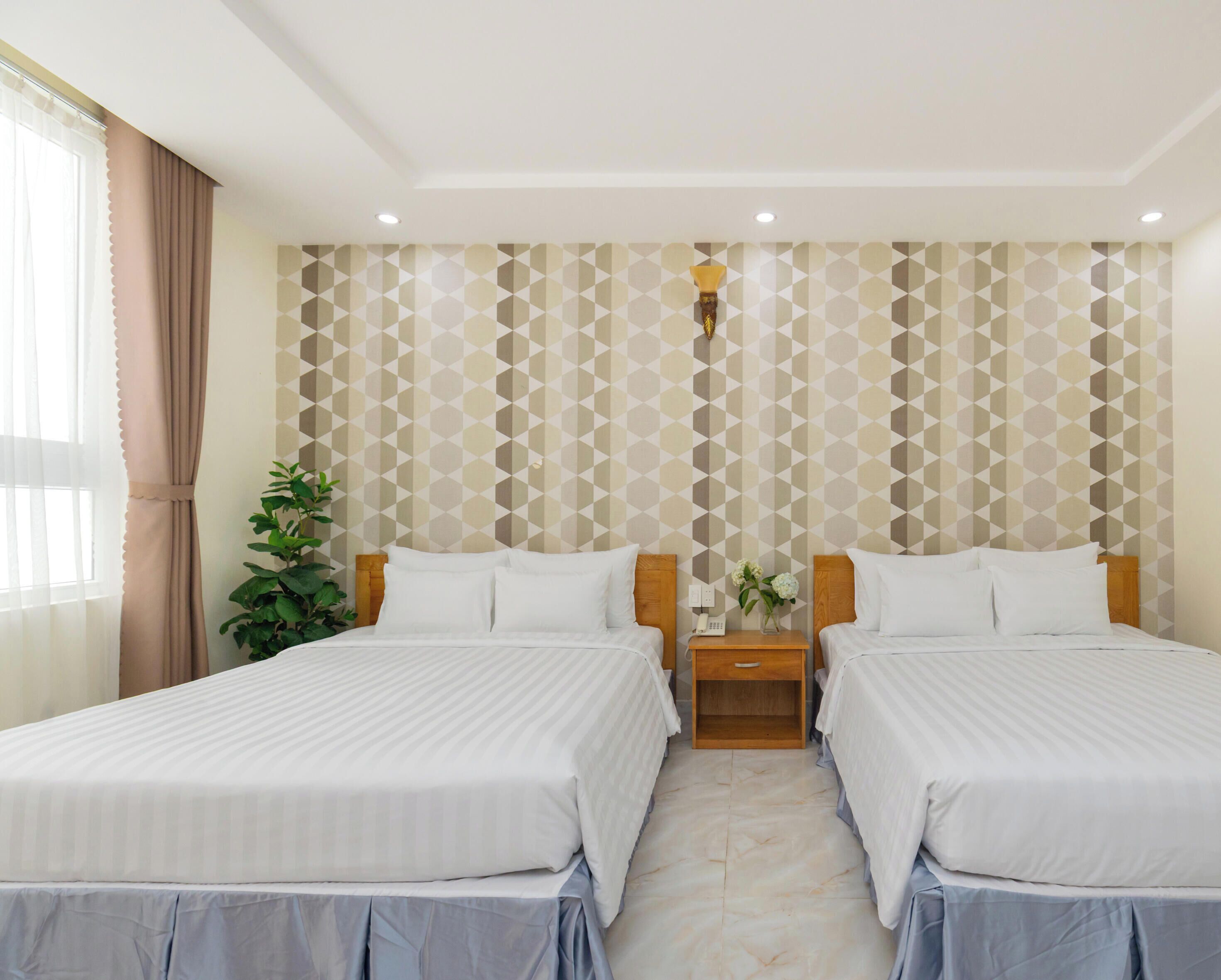 Deluxe Twin Room | Minibar, desk, free WiFi, bed sheets