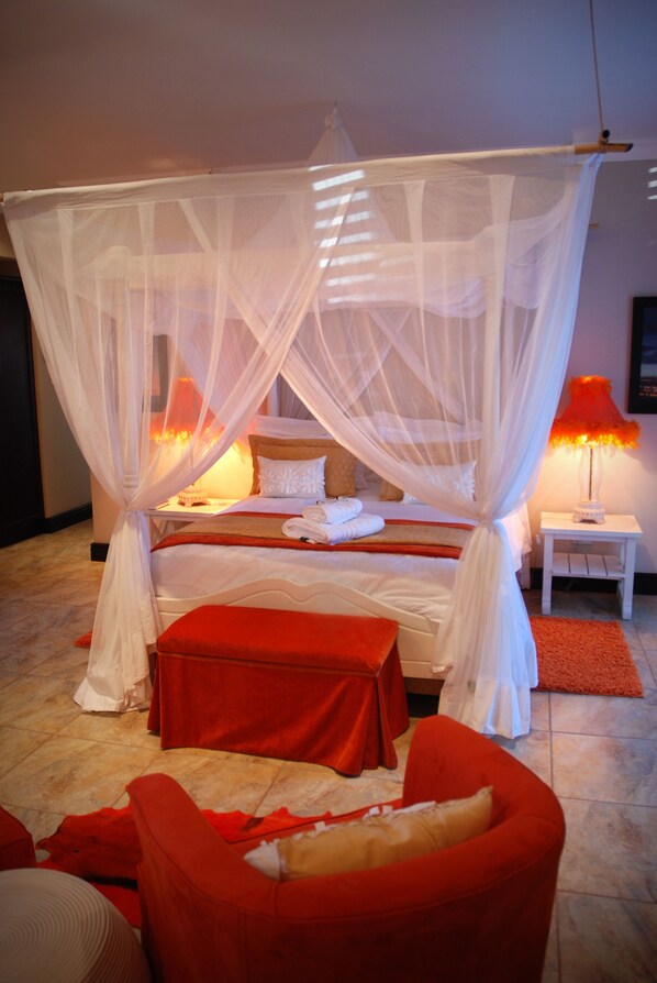 Premium bedding, free minibar items, in-room safe, desk