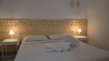 Kamar Quadruple | Minibar, kedap suara, setrika/meja setrika, dan tempat tidur bayi gratis