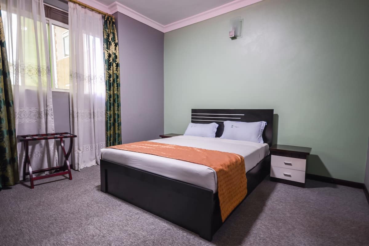 Appartamento, 2 camere da letto | Una scrivania, ferro/asse da stiro, Wi-Fi gratuito, lenzuola