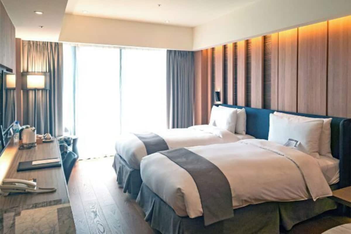 Hochwertige Bettwaren, Daunenbettdecken, kostenlose Minibar, Zimmersafe