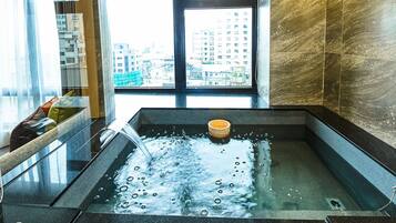 Premium bedding, down comforters, free minibar, in-room safe