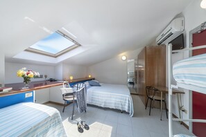Family Room, Multiple Beds | Minibar, in-room safe, desk, cribs/infant beds
