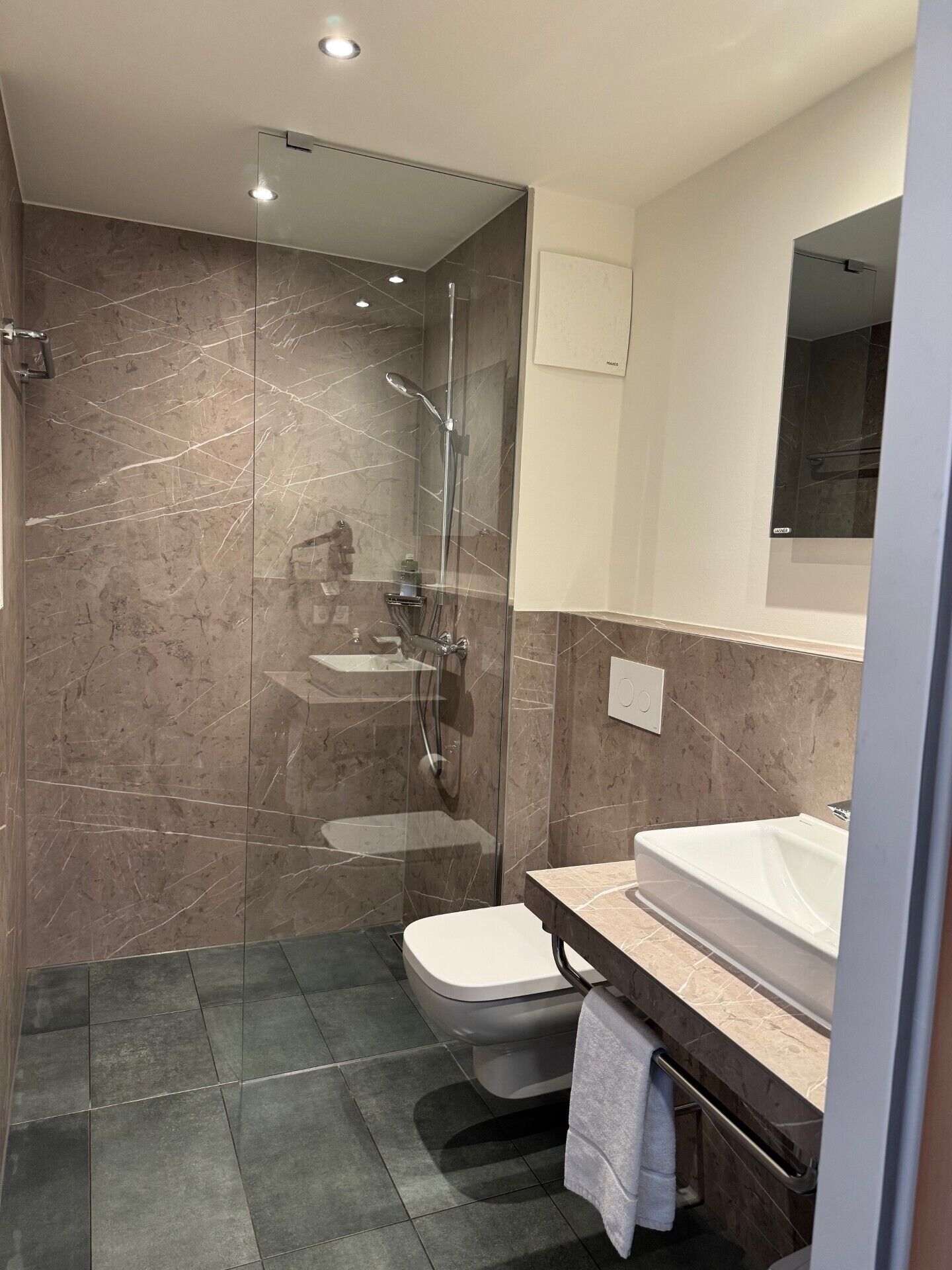 eco-friendly toiletries, hair dryer, towels, soap